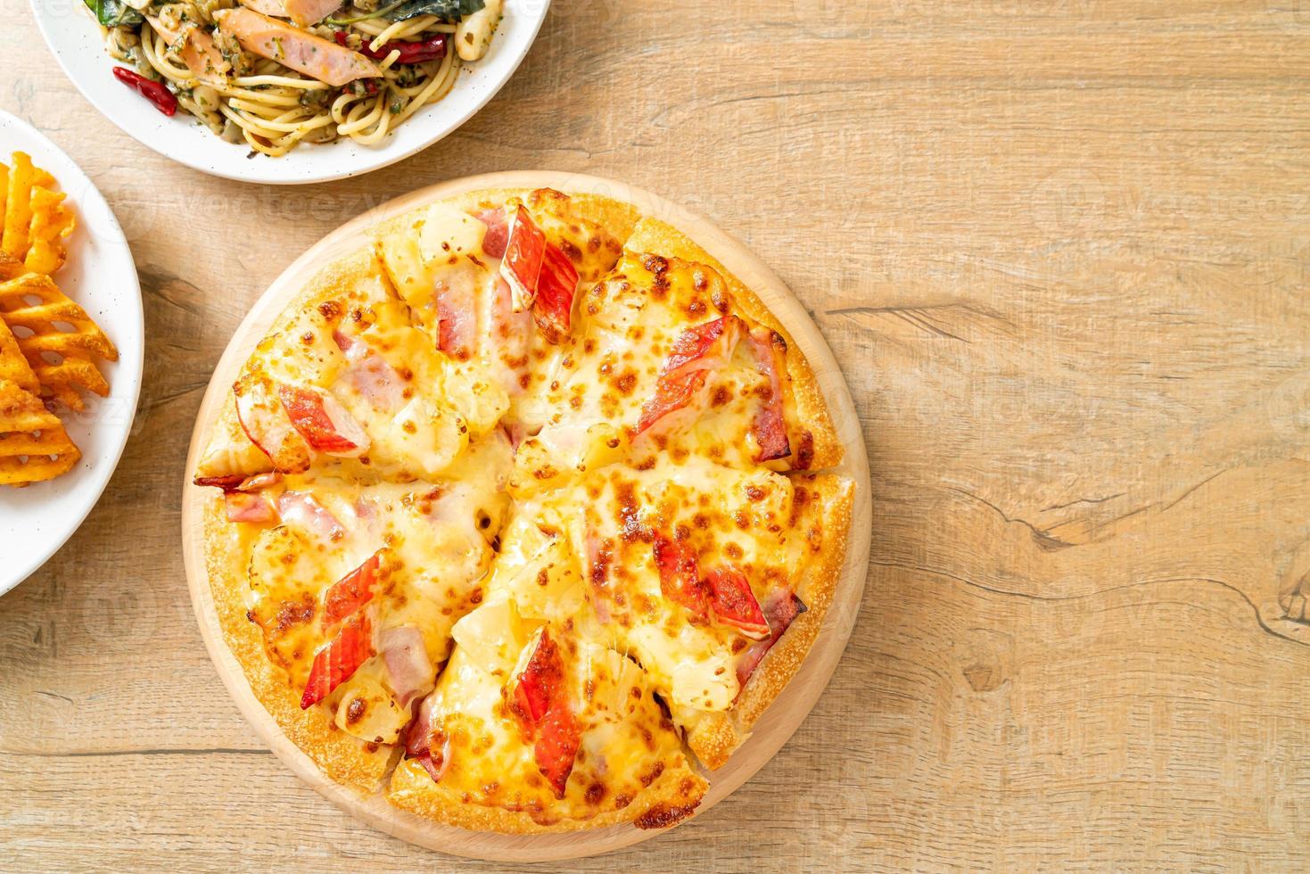 Ham and crab stick pizza or Hawaiian pizza photo