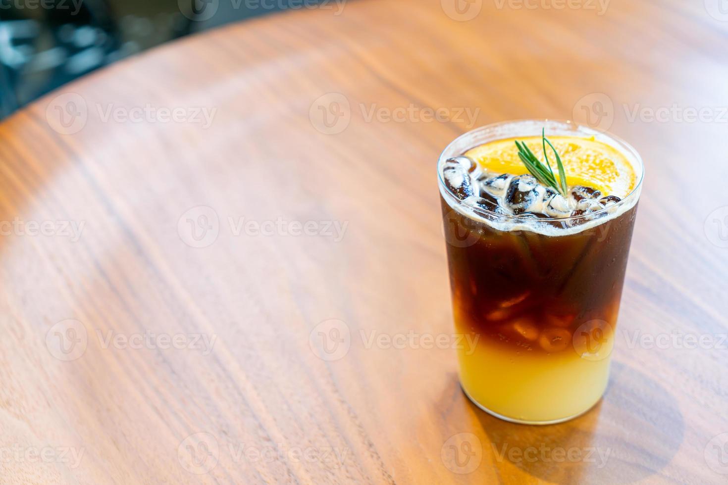 Yuzu orange coffee glass in coffee shop cafe restaurant photo