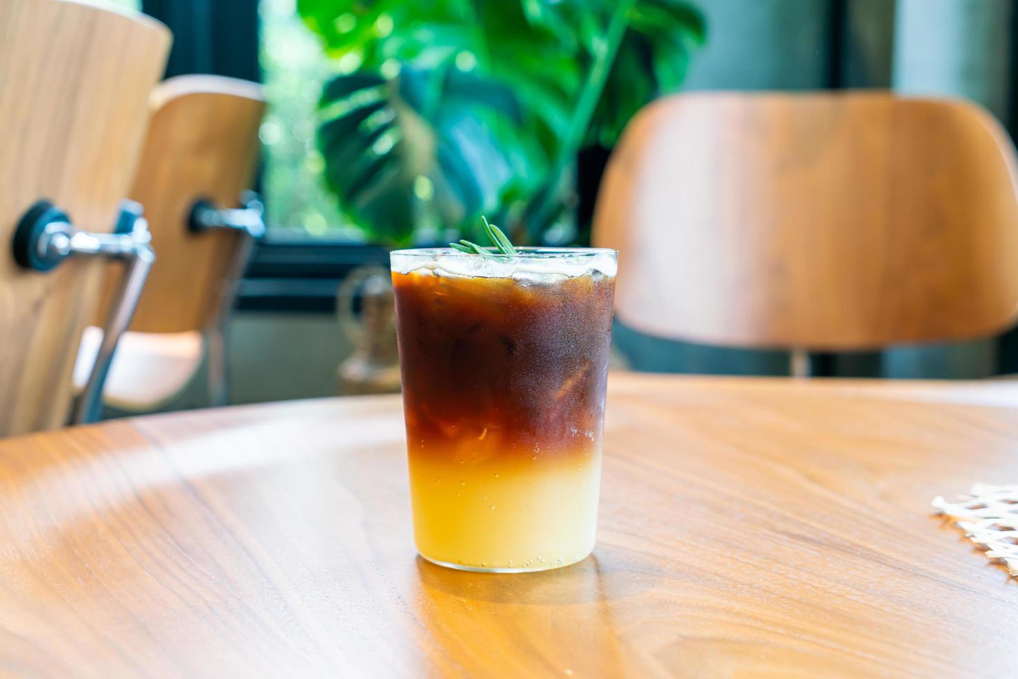 Yuzu orange coffee glass in coffee shop cafe restaurant photo