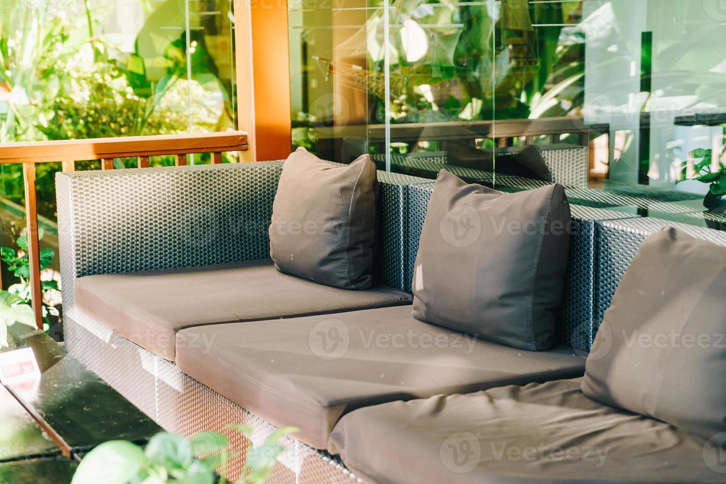 Comfortable pillow decoration on sofa at balcony area photo