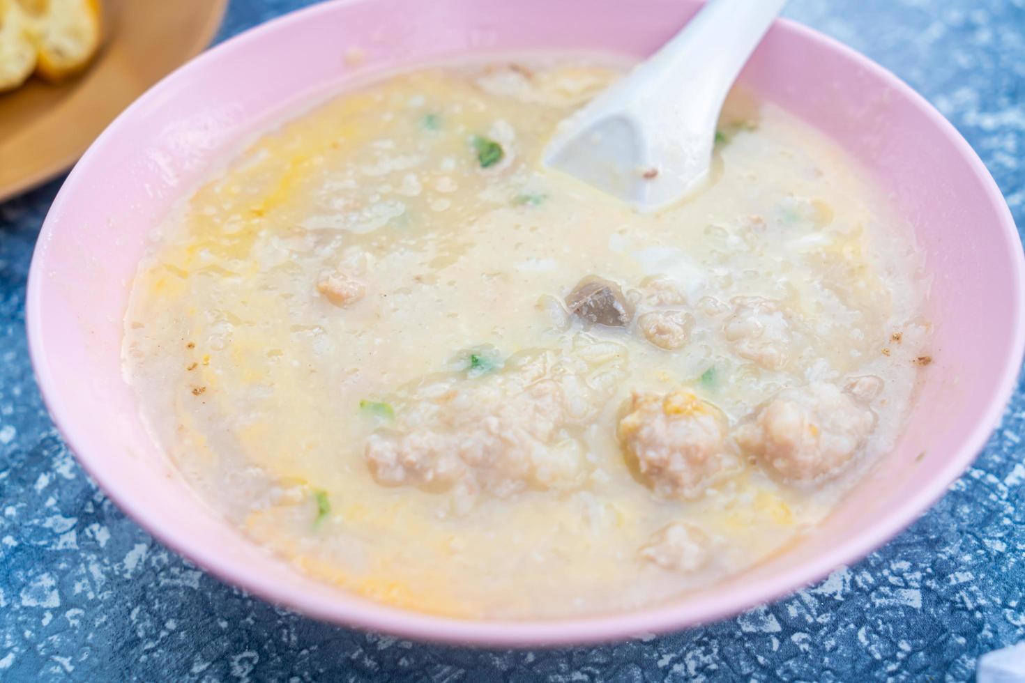 Pork congee with egg for breakfast photo