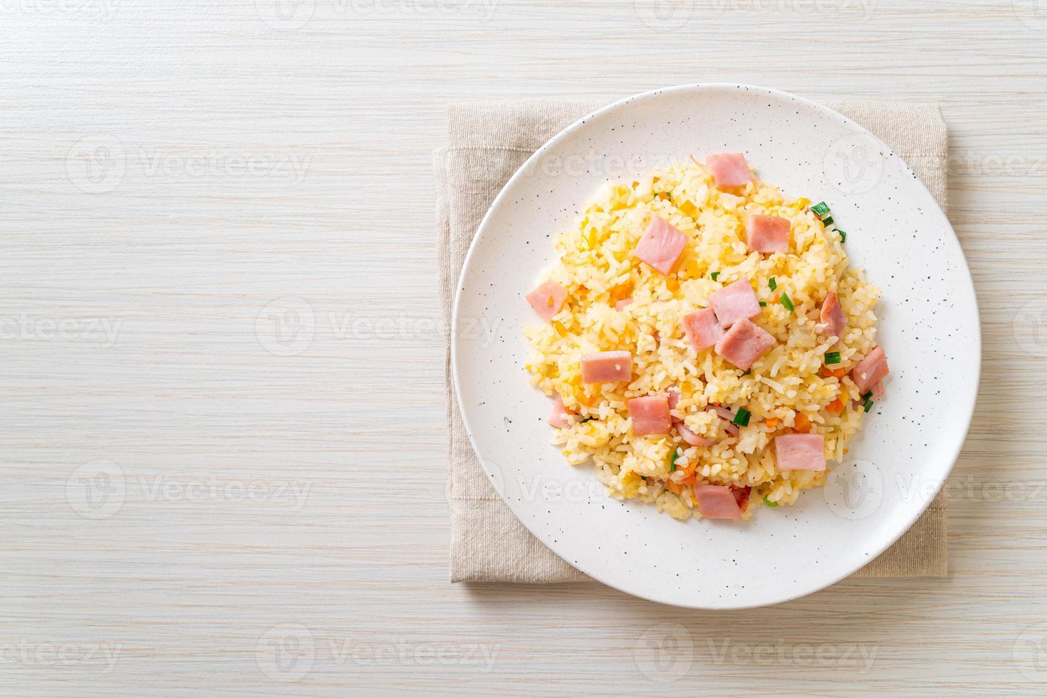 Homemnade fried rice with ham on plate photo