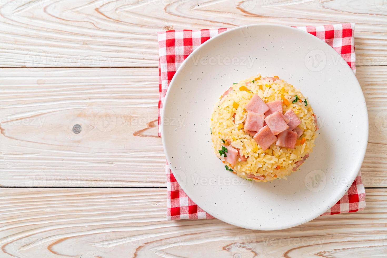 Homemnade fried rice with ham on plate photo