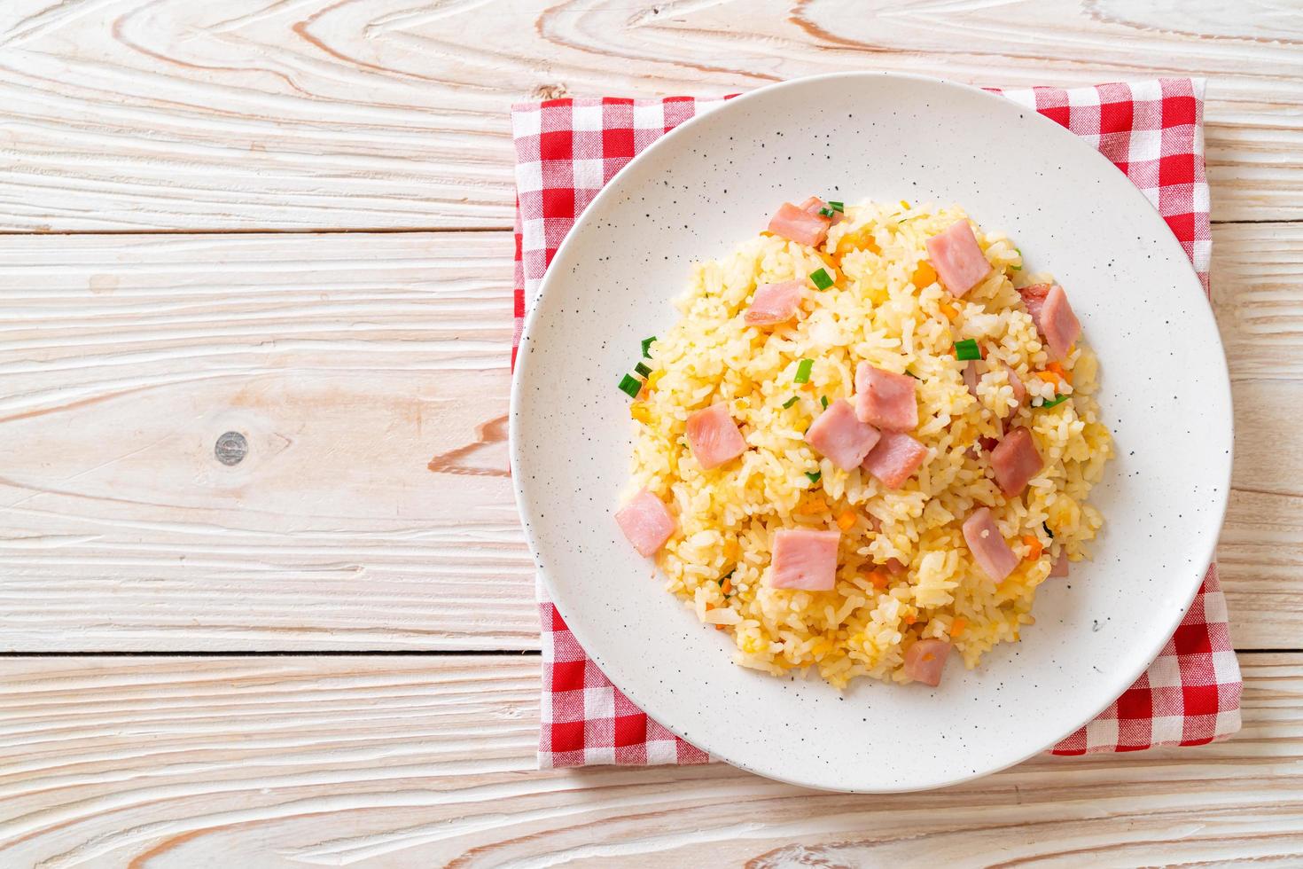 Homemnade fried rice with ham on plate photo