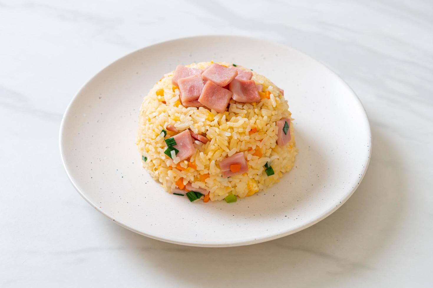 Homemnade fried rice with ham on plate photo