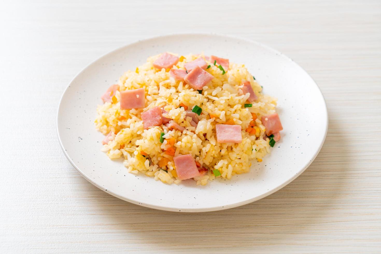 Homemnade fried rice with ham on plate photo