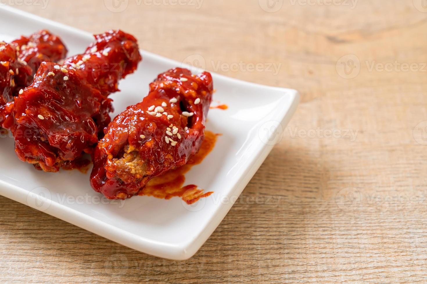 Fried chicken with spicy sauce in Korean style photo