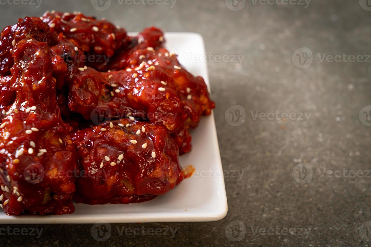 Fried chicken with spicy sauce in Korean style photo