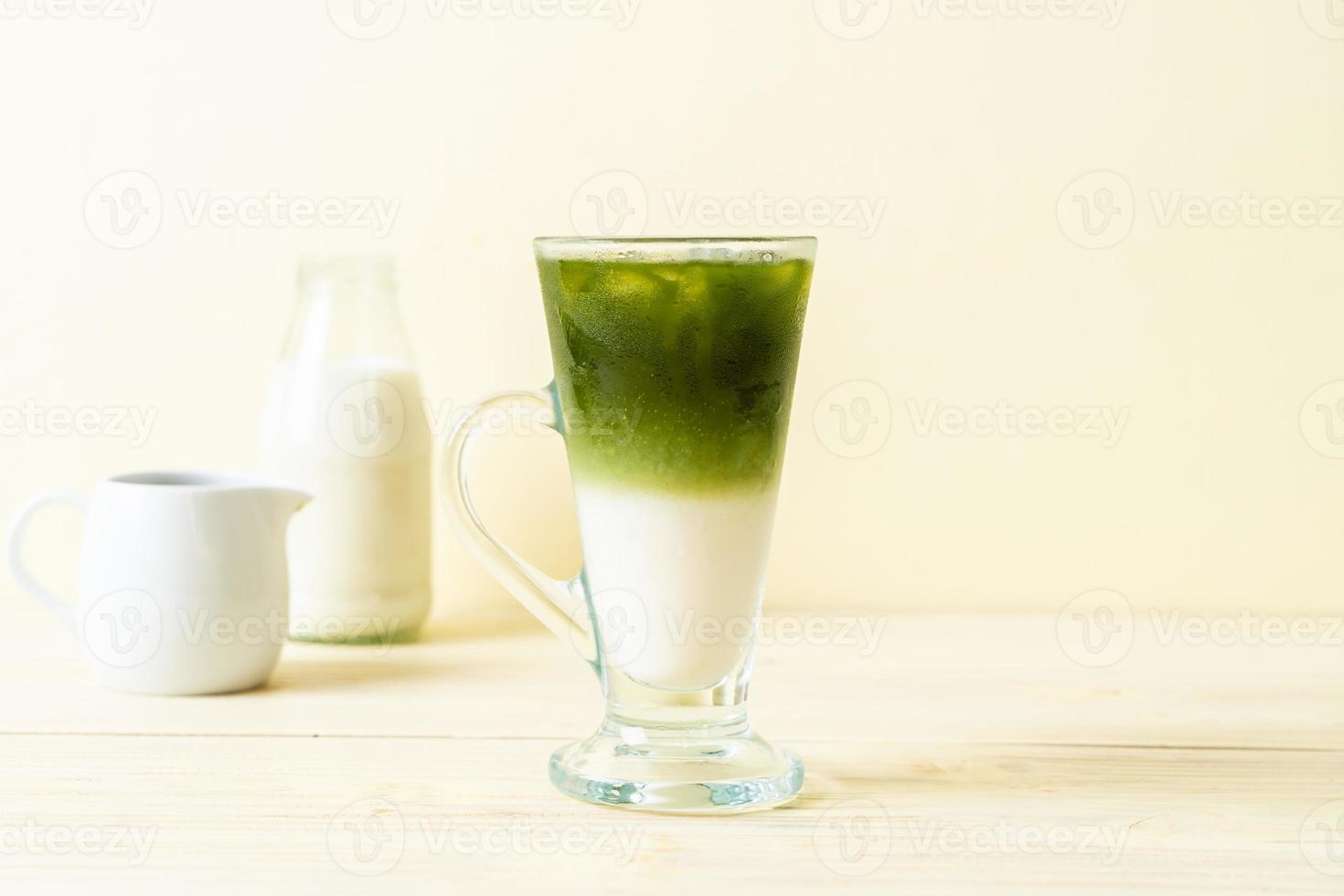 Iced matcha green tea latte with milk photo