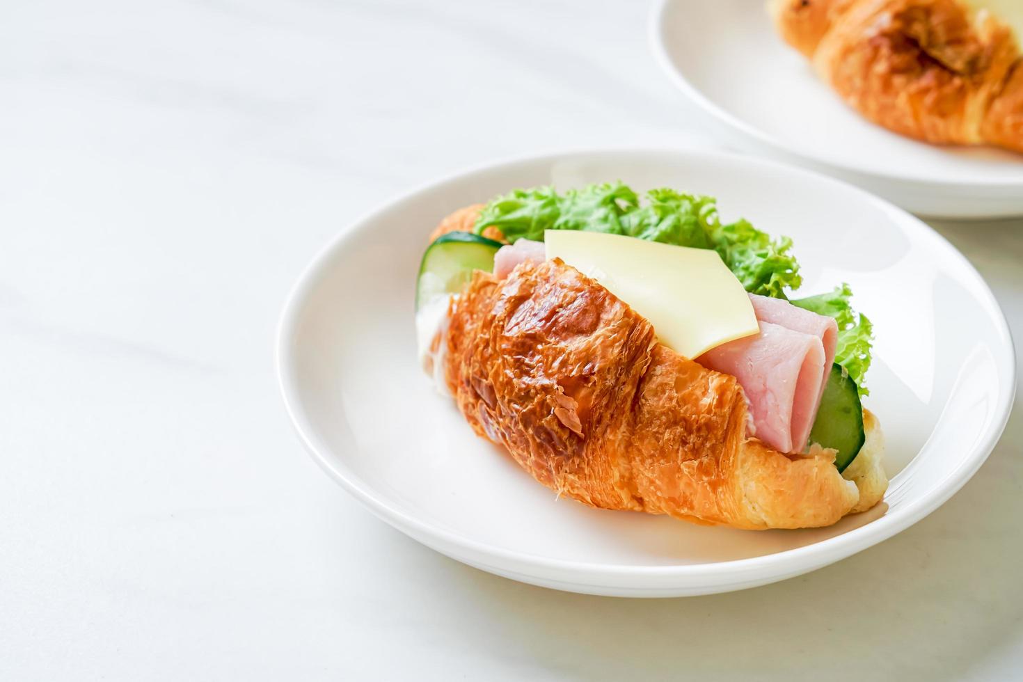 Sandwich croissant ham cheese with mayonnaise photo