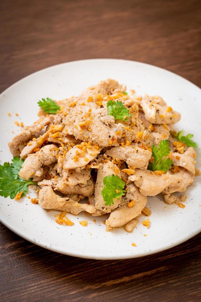 Stir-fried chicken with garlic and pepper photo