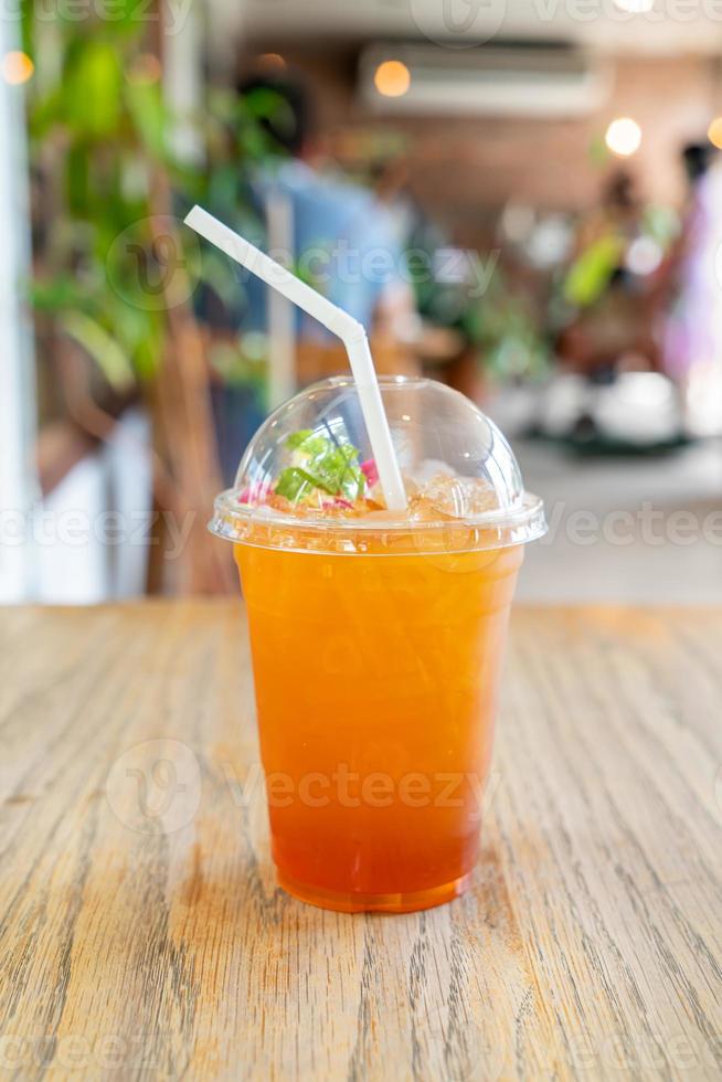 Iced lemon tea glass in coffee shop cafe and restaurant photo