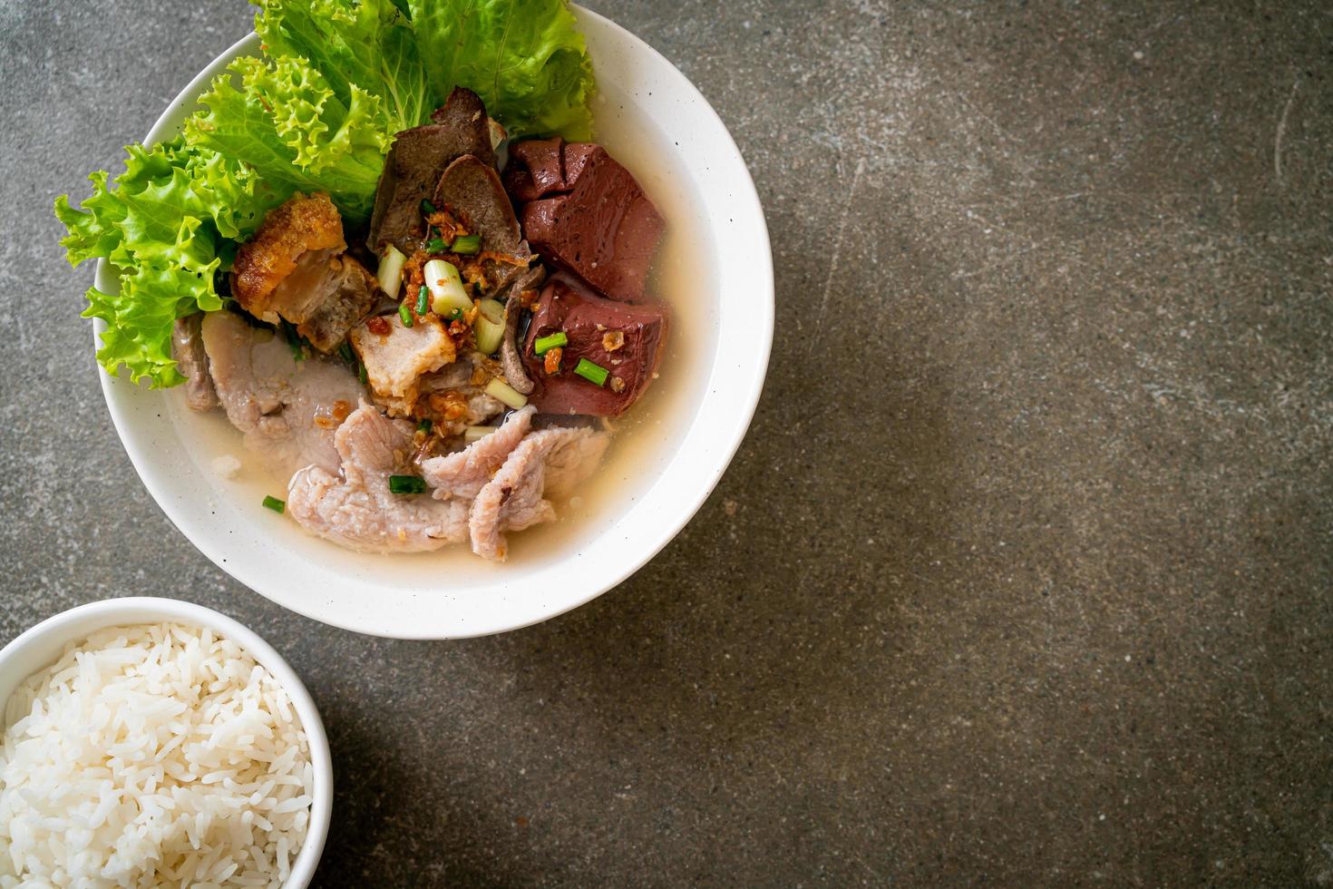 Pork's entrails and blood jelly soup bowl with rice - Asian food style photo