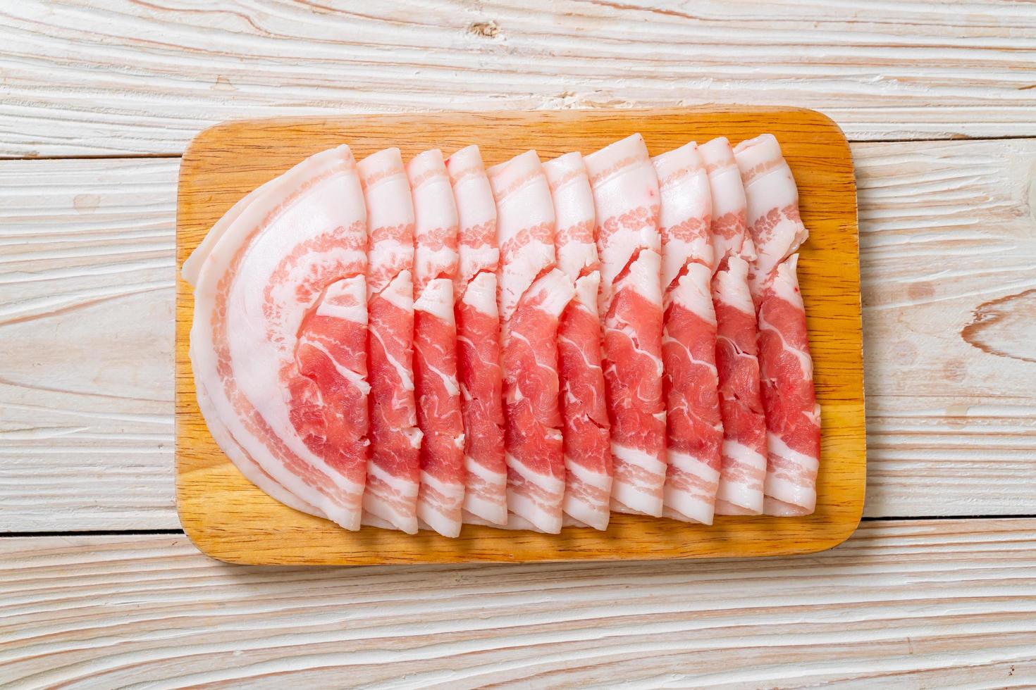 Fresh raw pork belly sliced photo