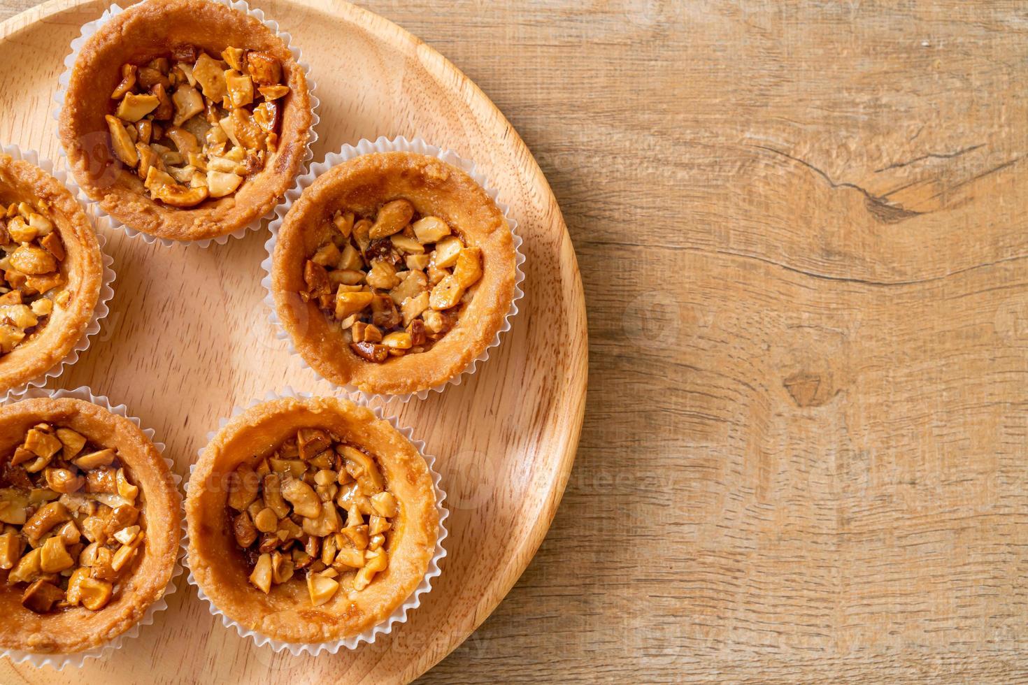 Roasted cashews nut tart on plate photo