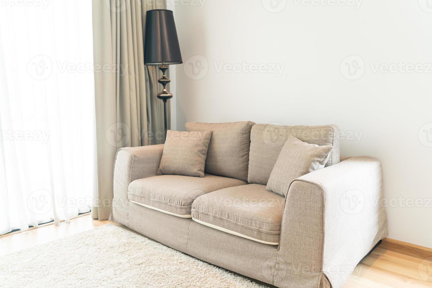 Beautiful pillow decoration on sofa in living room photo