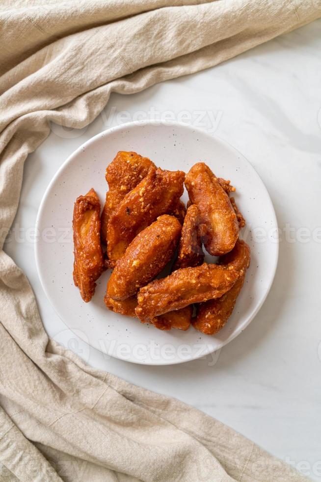 Deep-fried sliced potatoes stick with sesame - Thai food style photo