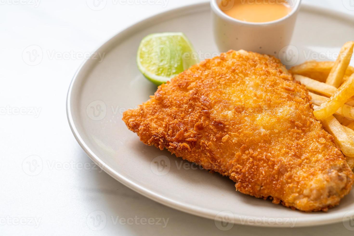 Fried fish and potato chips photo