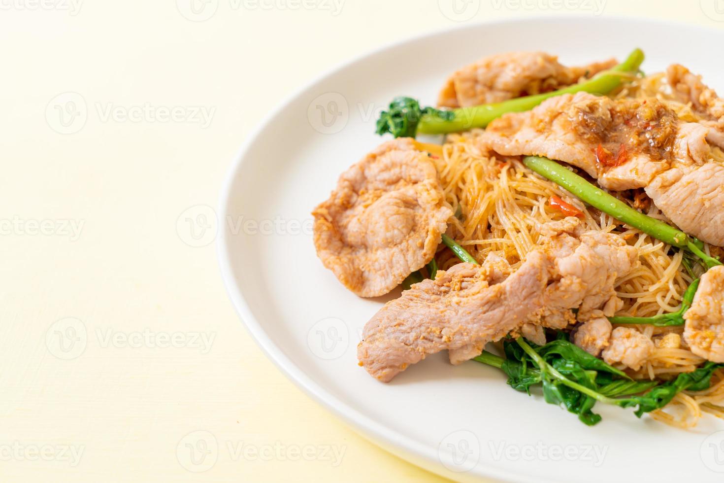 Stir-fried rice vermicelli and water mimosa with pork photo