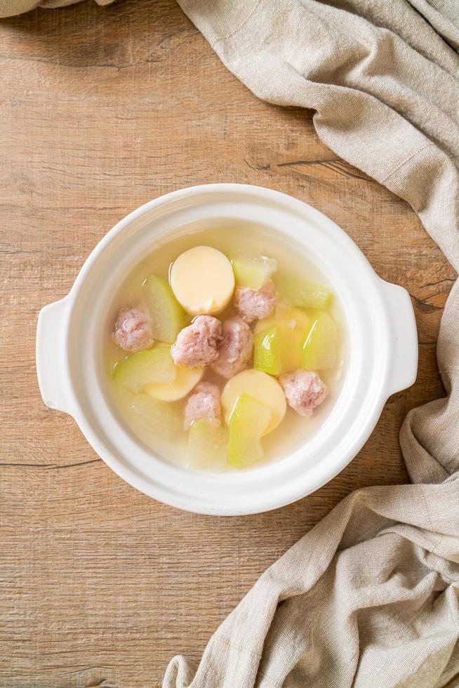 Wintermelon soup with minced pork and egg tofu bowl photo