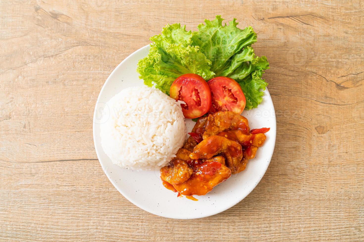 Fried fish topped by 3 flavors chili sauce with rice photo