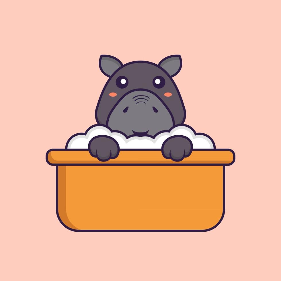 Cute hippopotamus taking a bath in the bathtub. vector