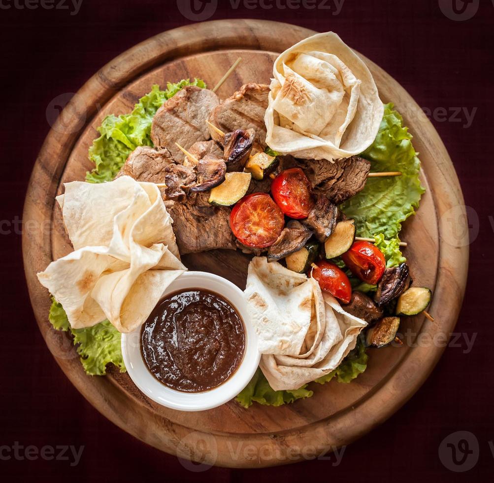 Meat and vegetable delicacies photo