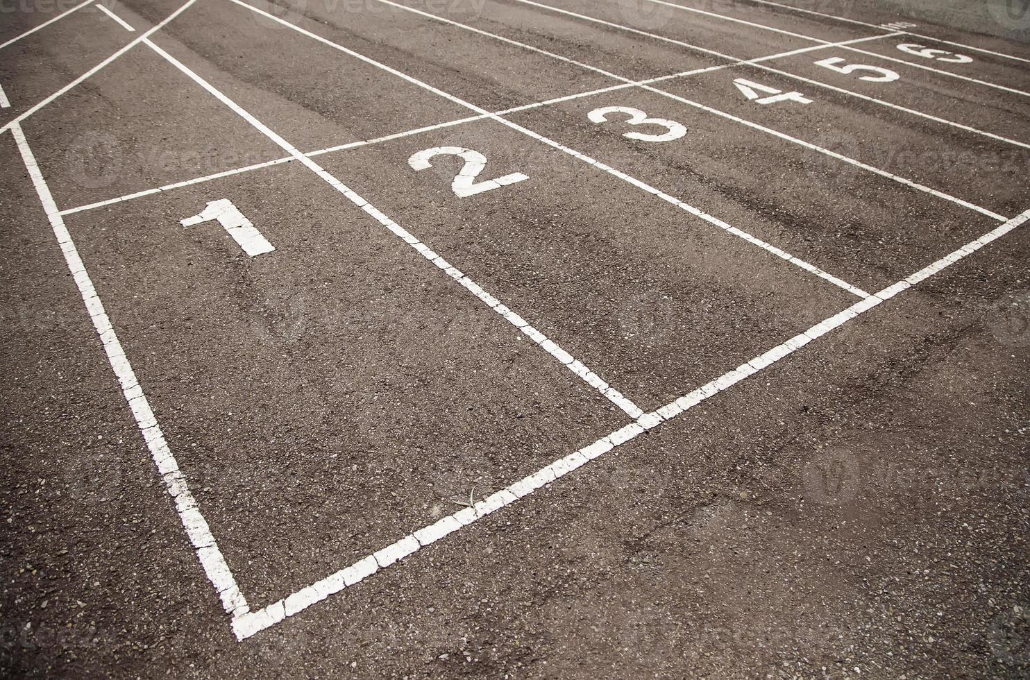 Numbers on running track photo