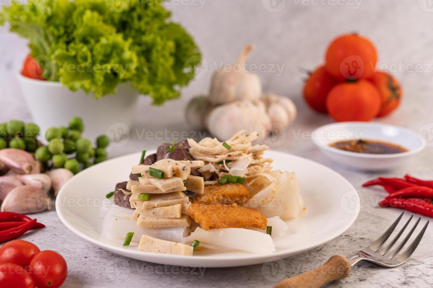 Large noodle noodles with pork blood sausage photo