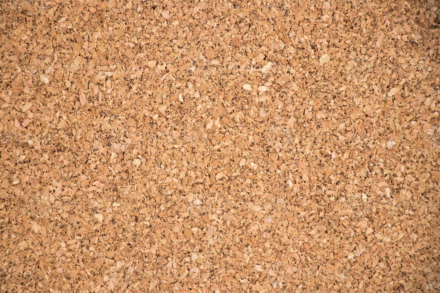 Closed up of brown cork board texture background photo