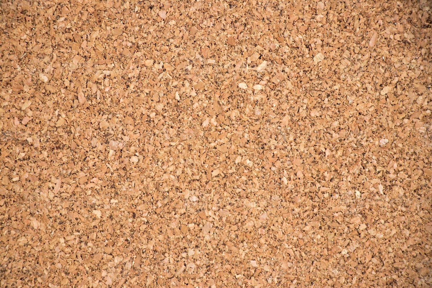 Closed up of brown cork board texture background photo