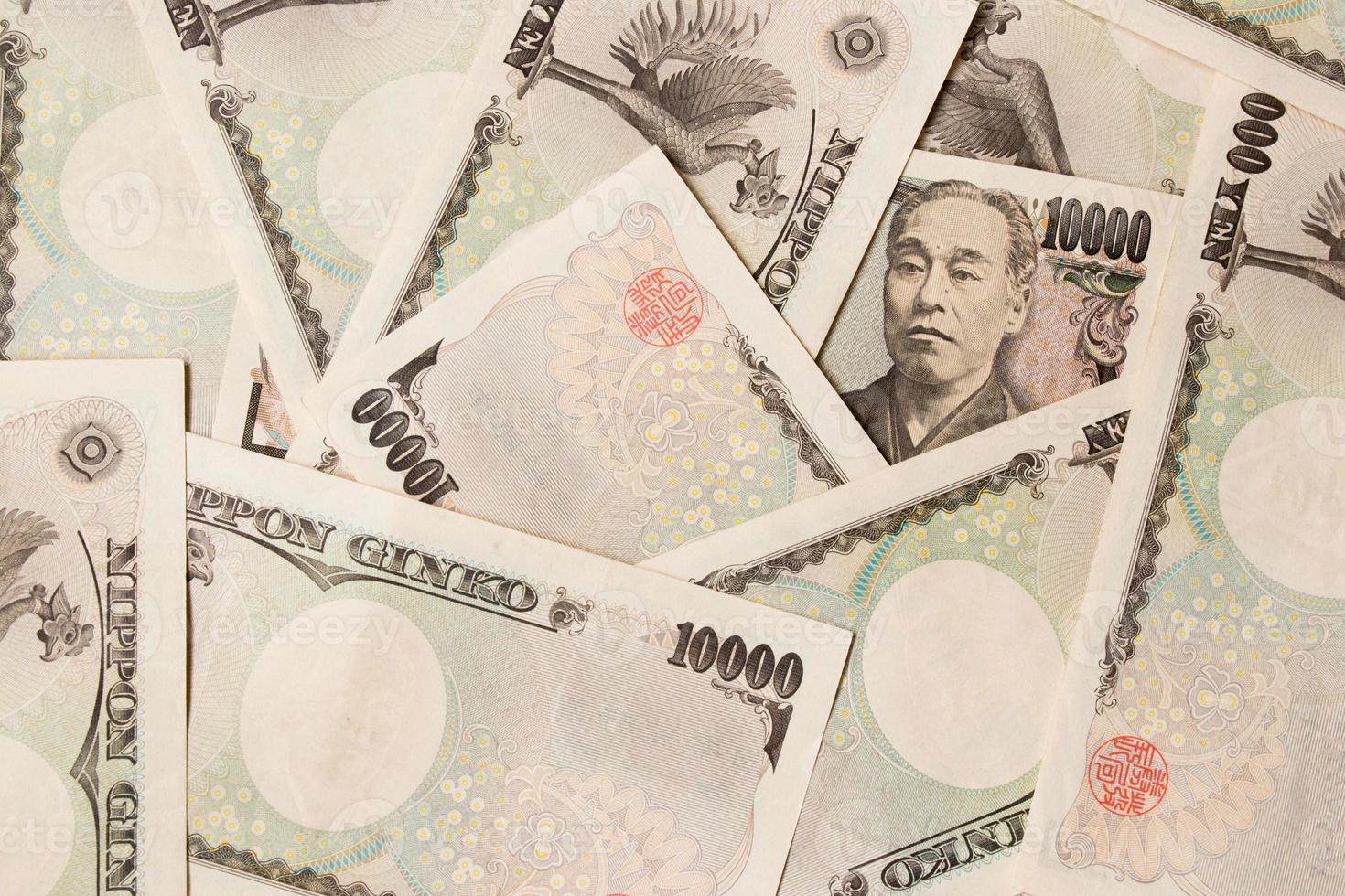 Grupo de billetes de banco japoneses 10000 yenes antecedentes foto