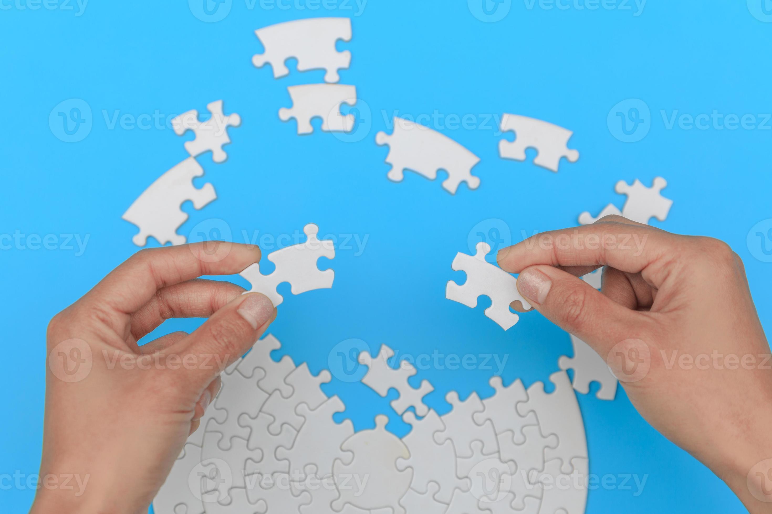 Jigsaw connection, Jigsaw puzzle in the hand of a businessman, Business team assembling Jigsaw