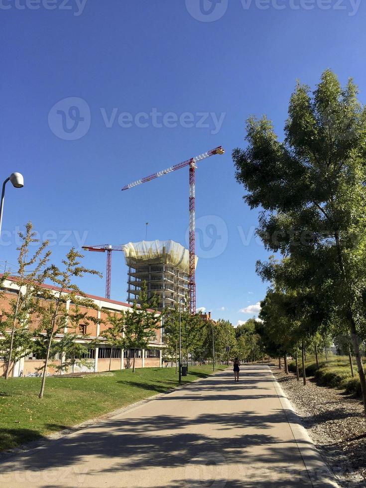 Construction cranes in Madrid, Spain photo