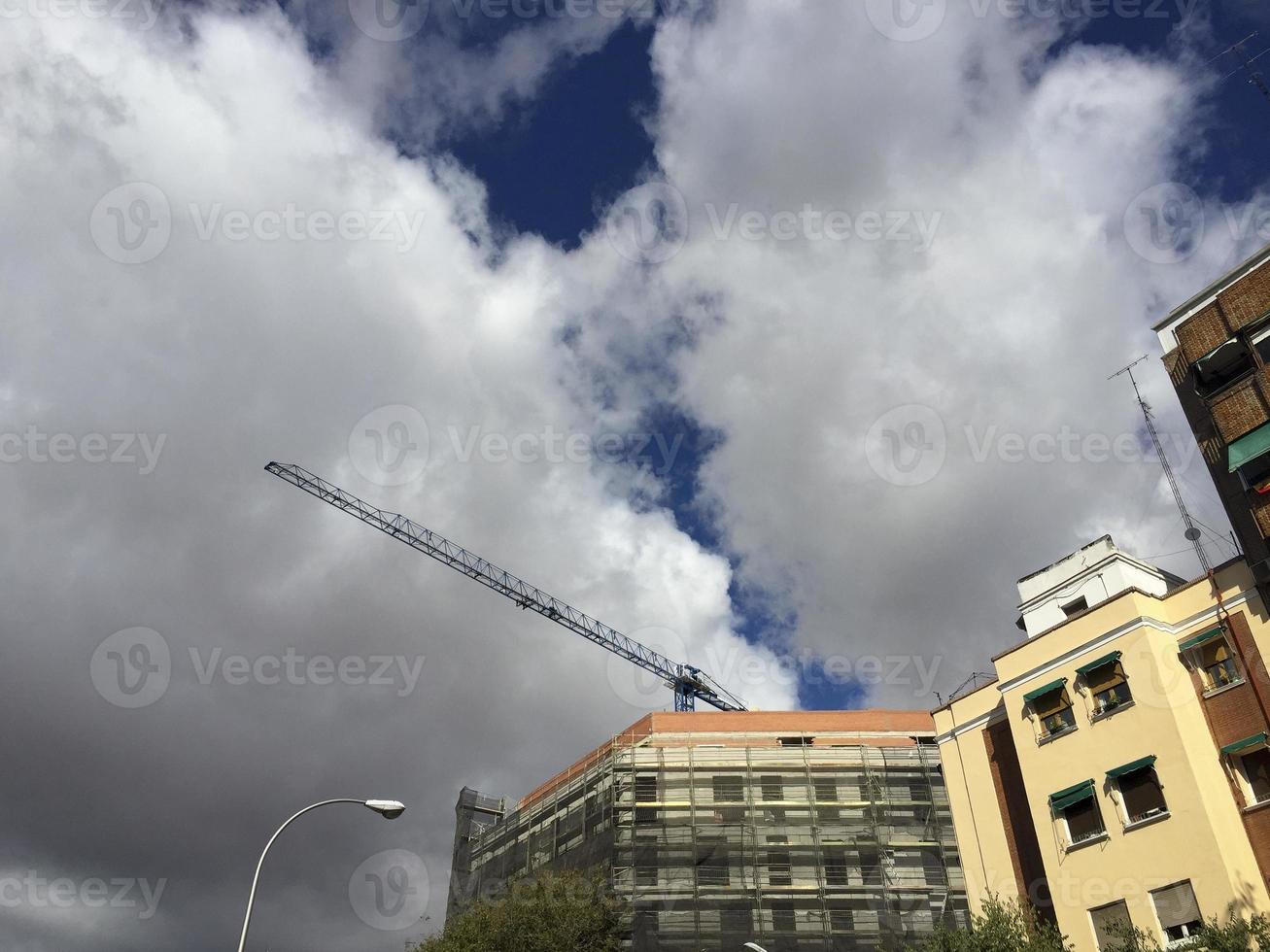 Construction cranes in Madrid, Spain photo