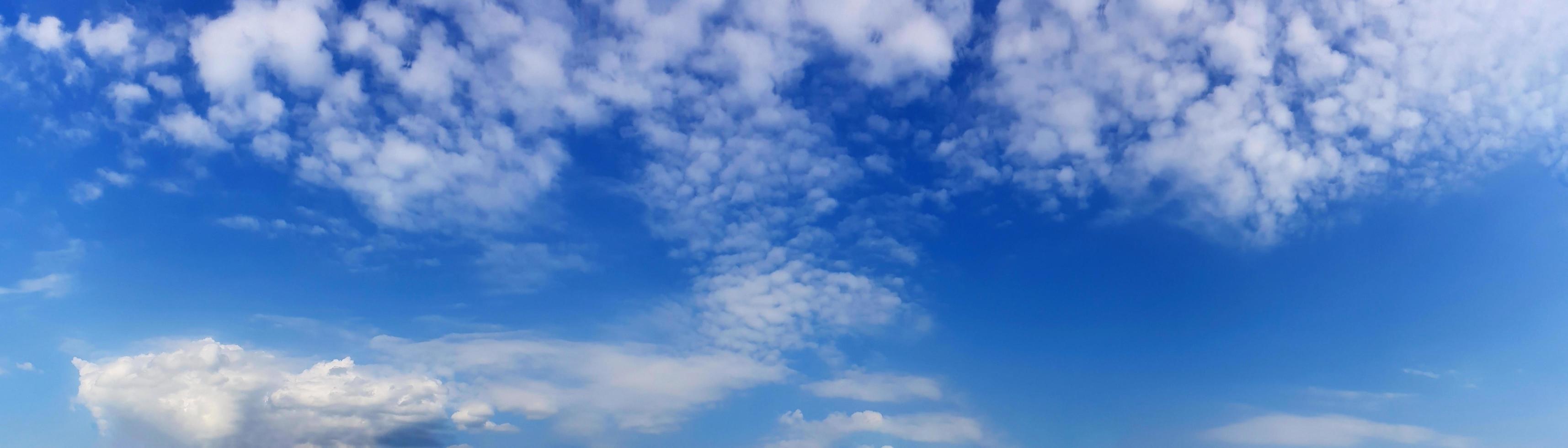 Panorama sky with cloud on a sunny day photo