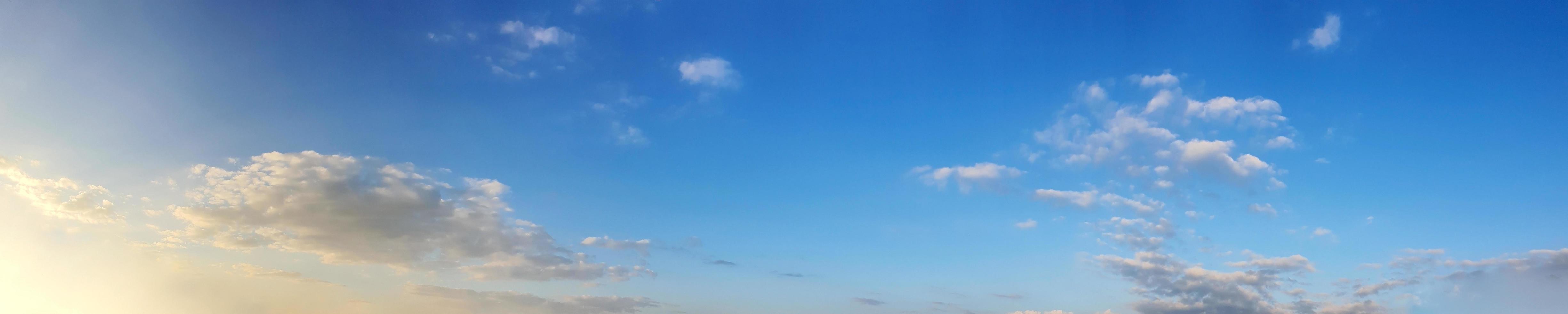 Panorama sky with cloud on a sunny day photo