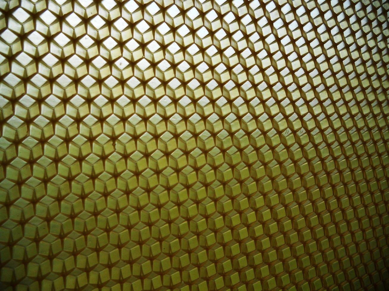 Fondo de textura hexagonal, panal de cera de una colmena de abejas foto