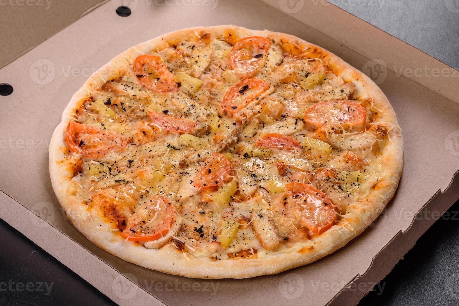 Fresh delicious pizza made in a hearth oven with shrimp mussels and other seafood photo