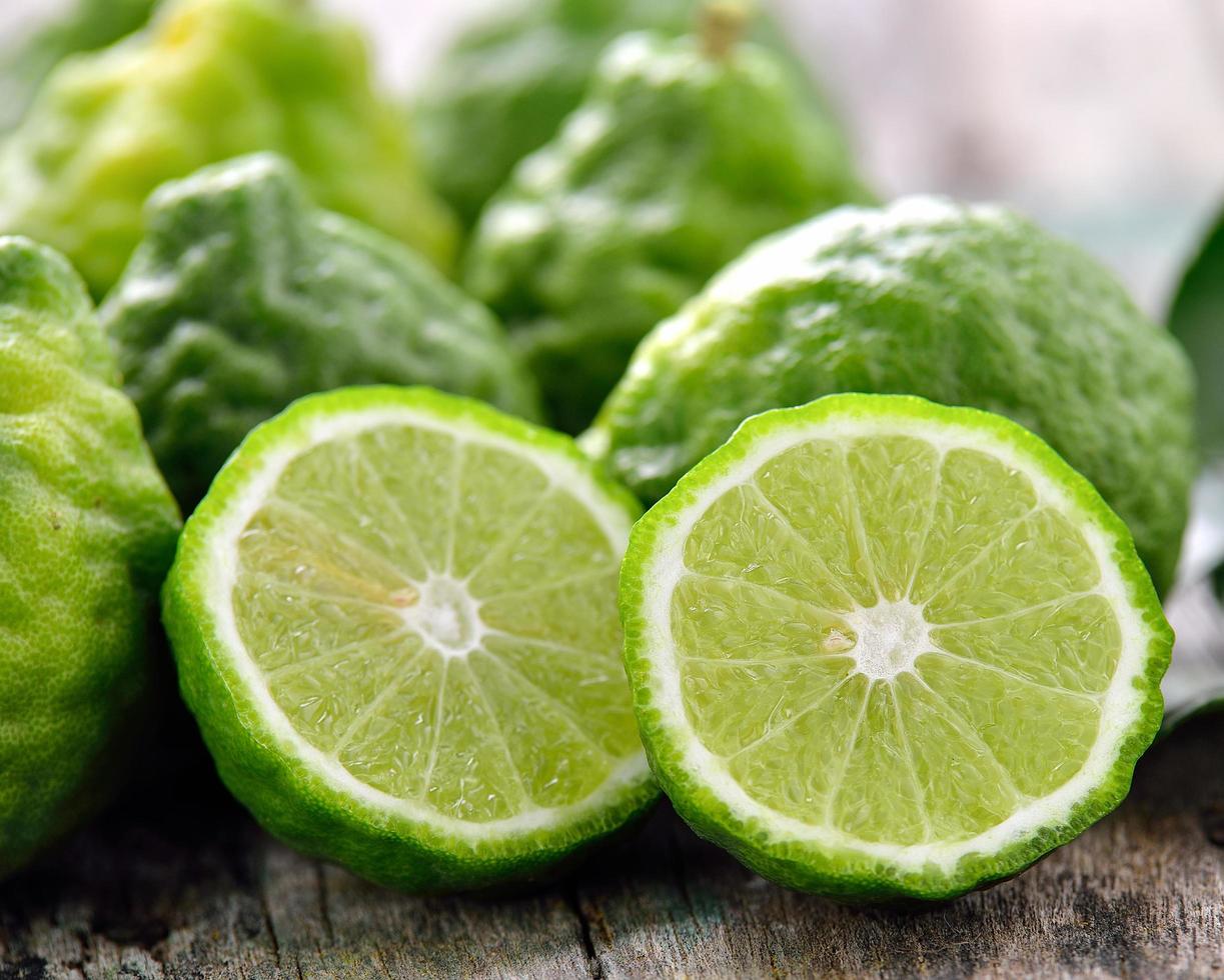 Bergamot on wooden table background photo