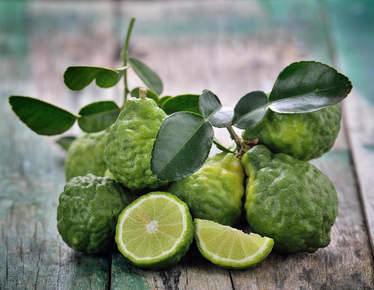 Bergamot on wooden table background photo