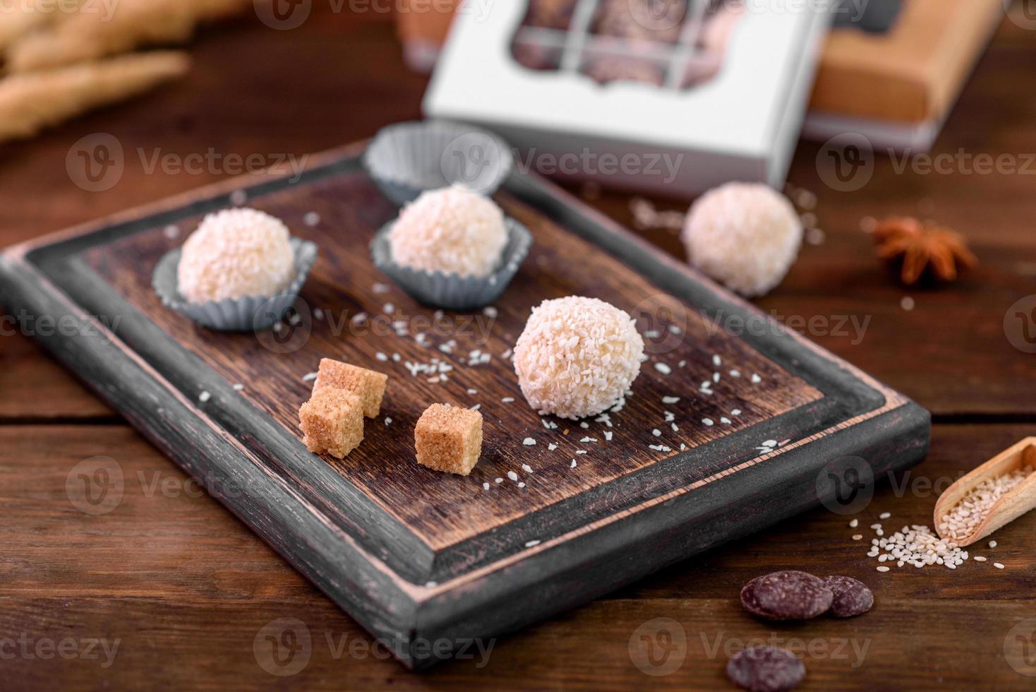Tasty fresh handmade sweet candy with cheese filling and sprinkling photo