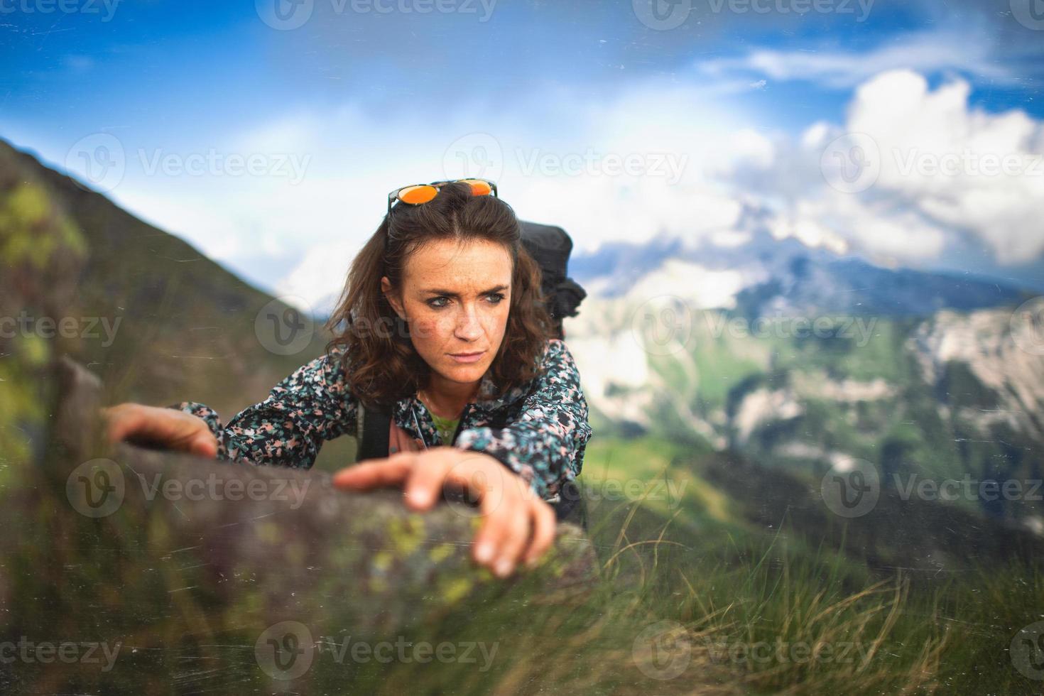 Beautiful sporty girl in a mountain pass. Vintage style photography photo