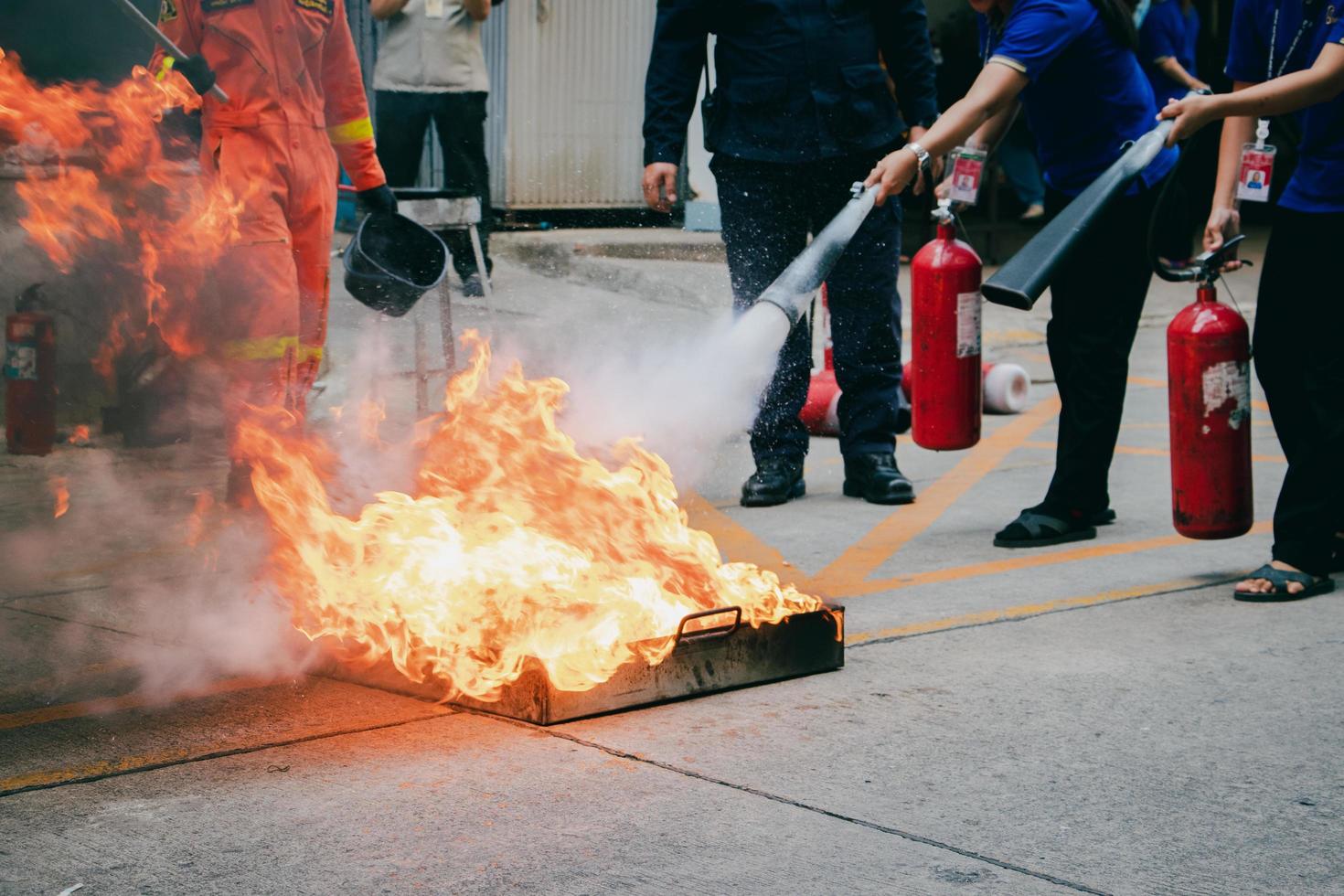 Employees firefighting training,Extinguish a fire. photo