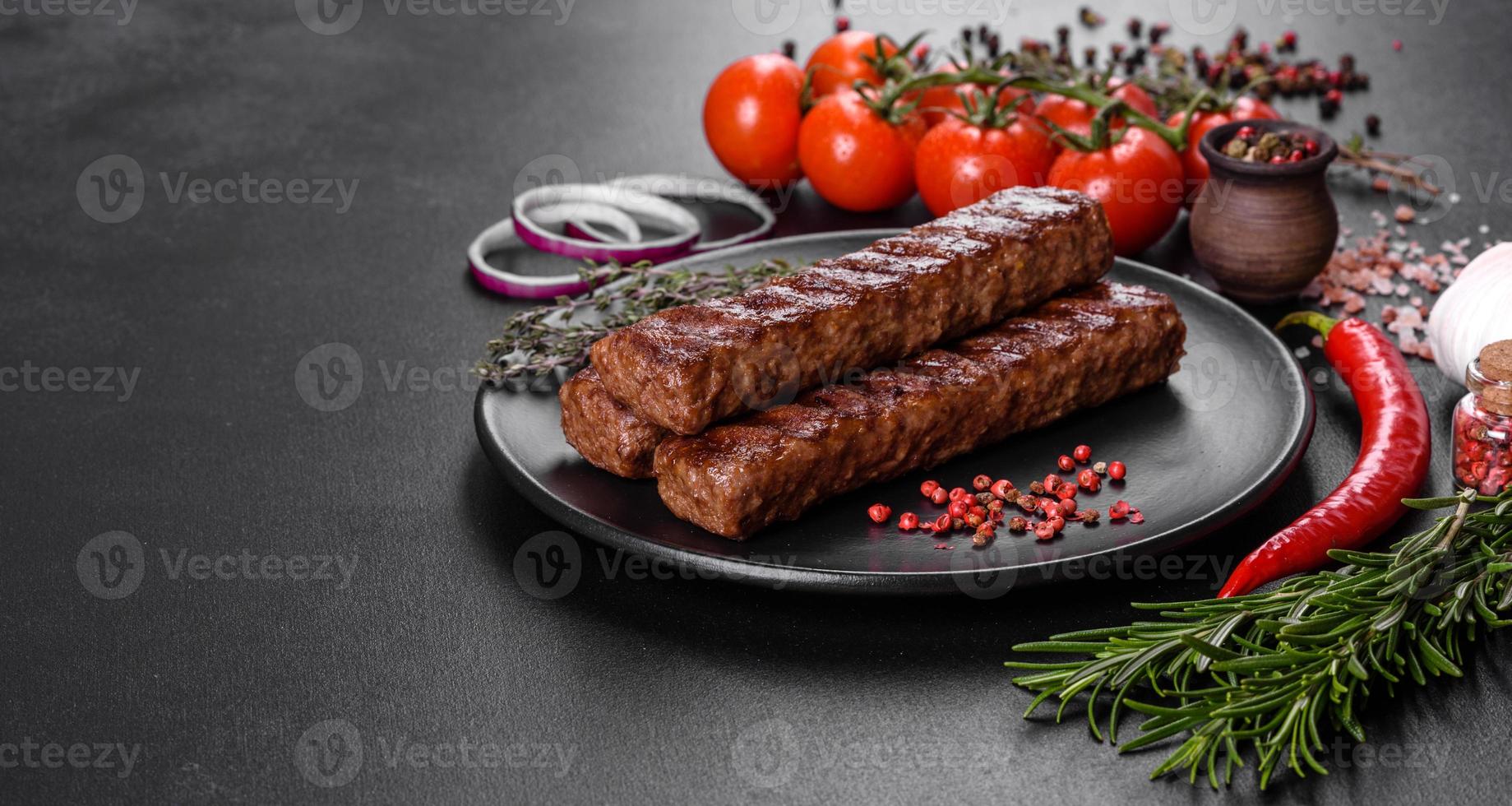 Fresh tasty kebab grilled with spices and herbs photo