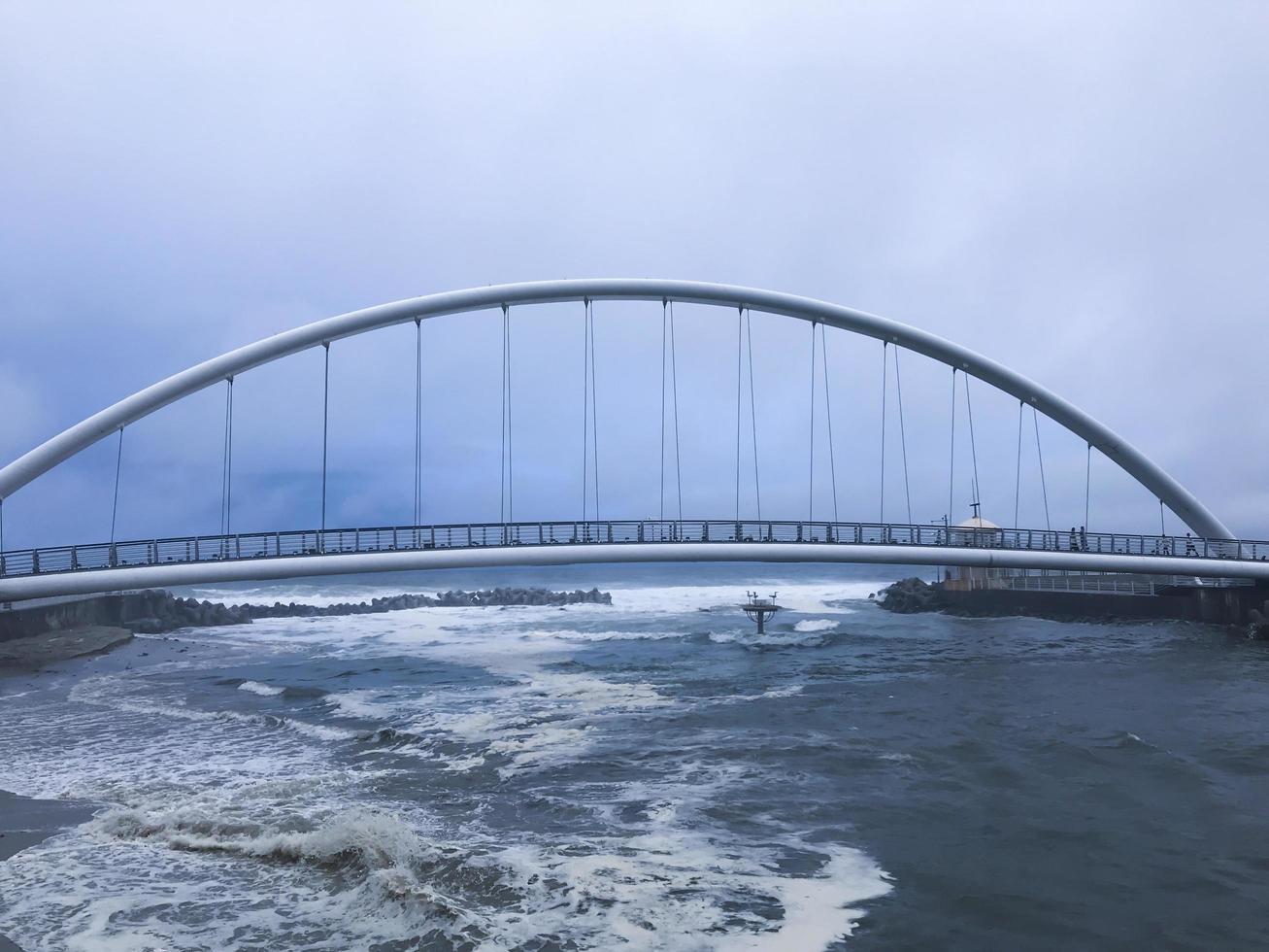 Arch bridge in Gangneung city near the sea, South Korea photo