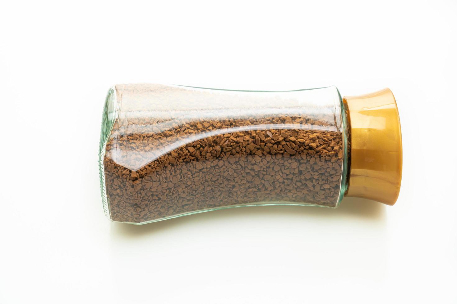 Instant coffee in glass bottle photo