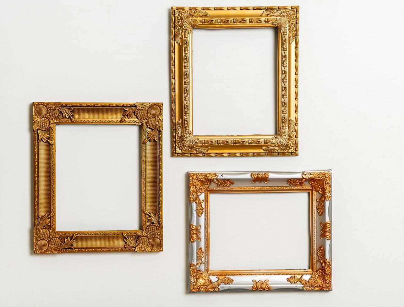 Empty picture frame on white wall background with copy space photo