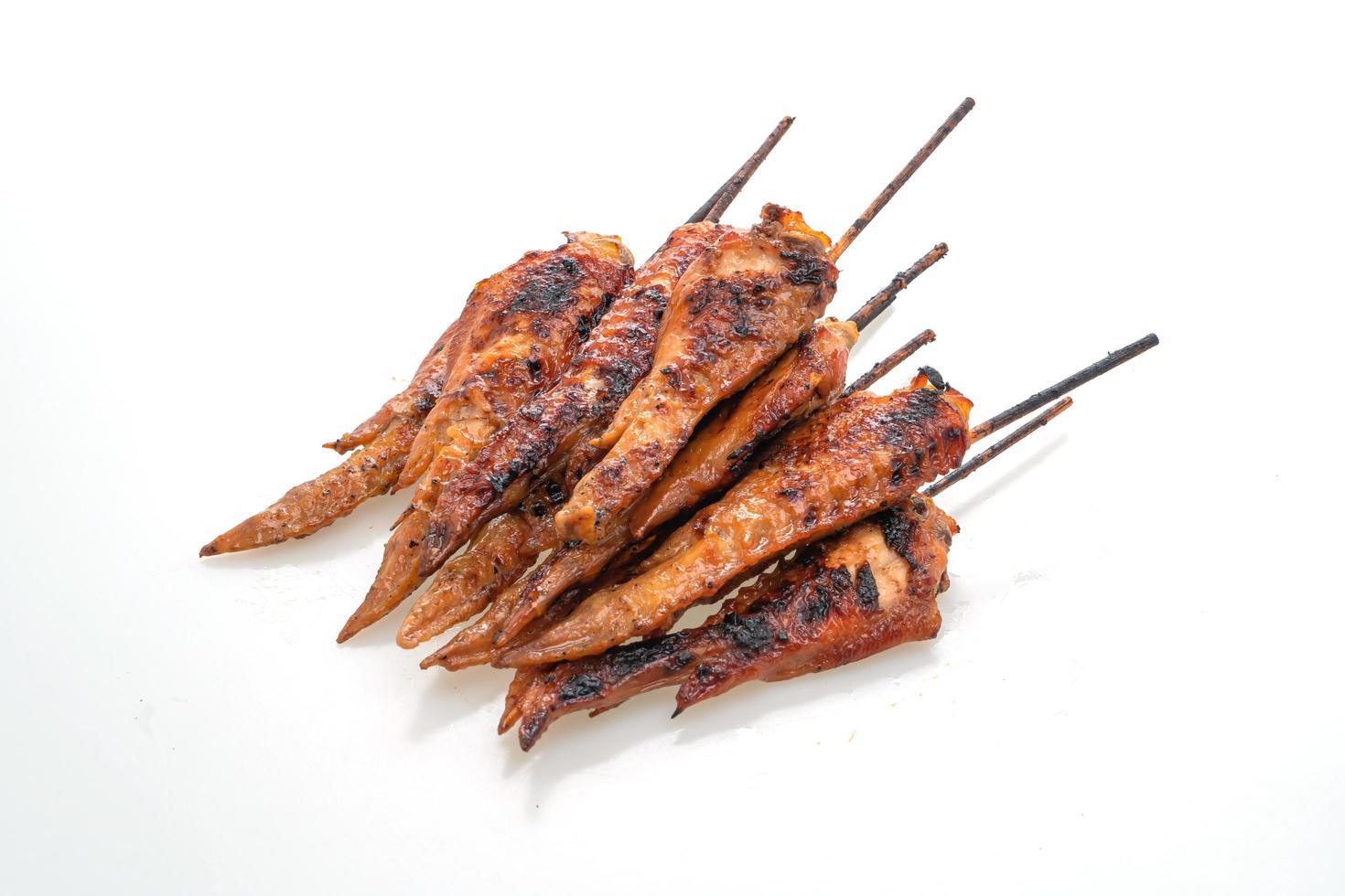 Grilled or barbecue chicken wings skewer with sticky rice photo