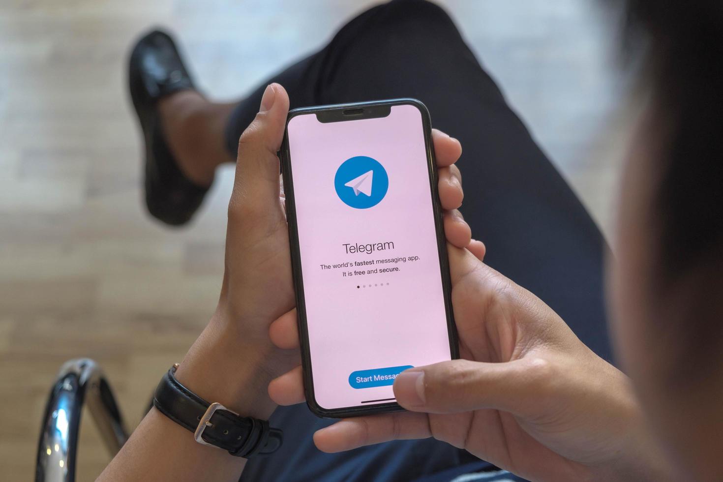 Chiang Mai, Thailand, Mar, 21, 2021 - Person using the Telegram app photo